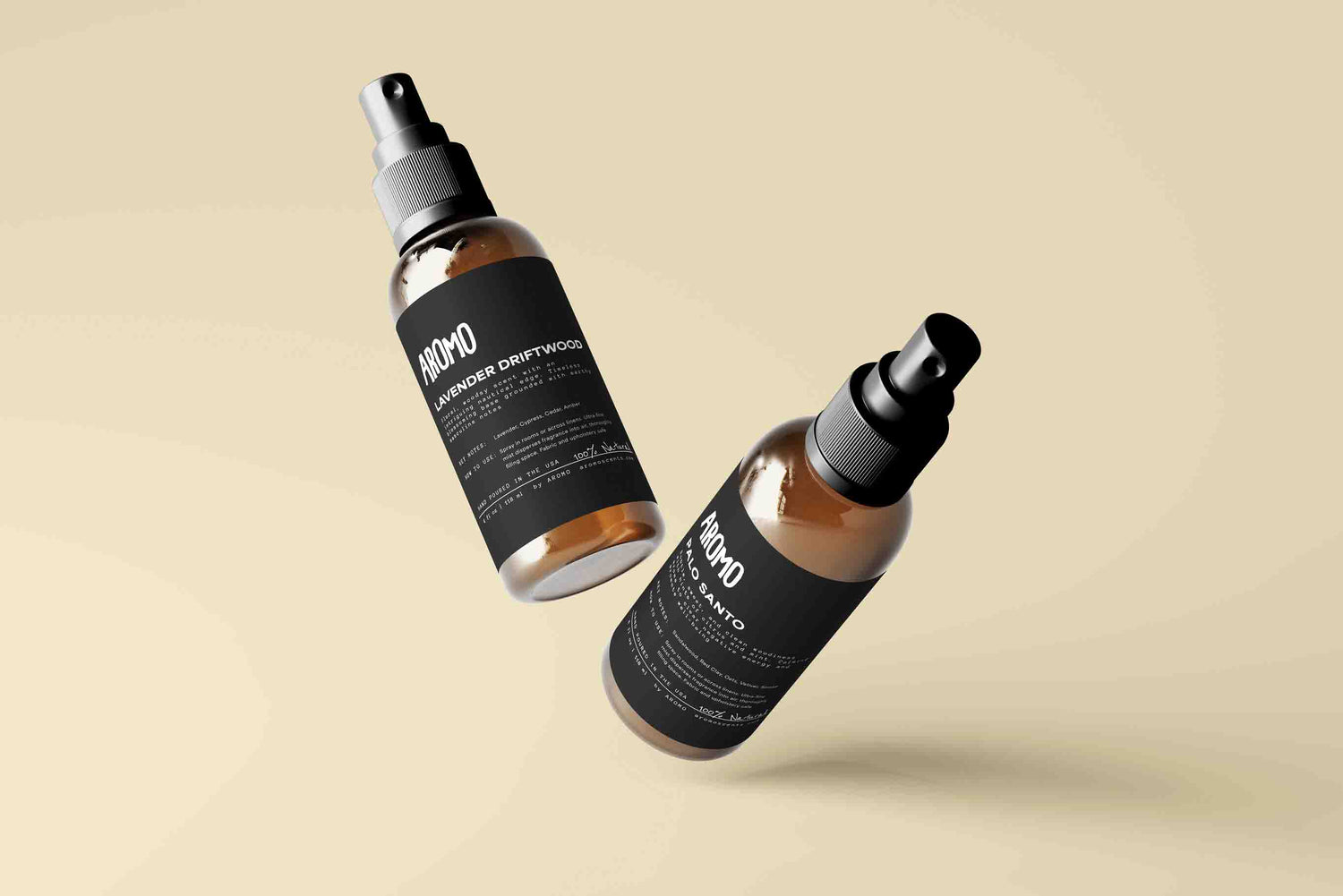 hero image of aromo sprays in a visually appealing manor. from left to right, lavender driftwood and palo santo room and linen spray